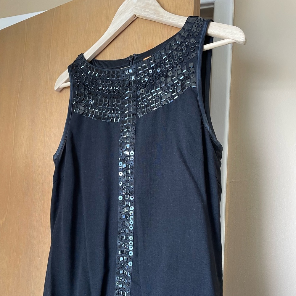 Never worn black embellished sleeveless top 85% wool 15% nylon Tory Burch